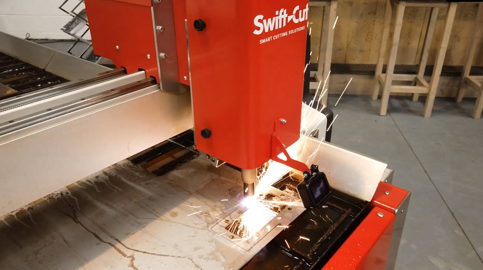 Swift-Cut Pro 1.5mm CNC cutting table cutting metal with sparks